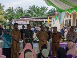 Polsek Kempas Lakukan Pengamanan Pasar Murah, Sampaikan Pesan Pemilu Damai.