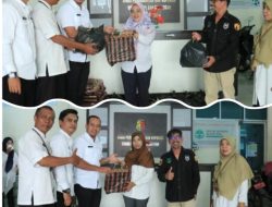 Dinas Koperindag Kota Solok Serahkan Bantuan Bagi Pegawainya Yang Terdampak Banjir